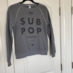 Grey SUB POP sweatshirt.